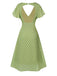 Robe verte à pois ajourés dans le dos des années 40