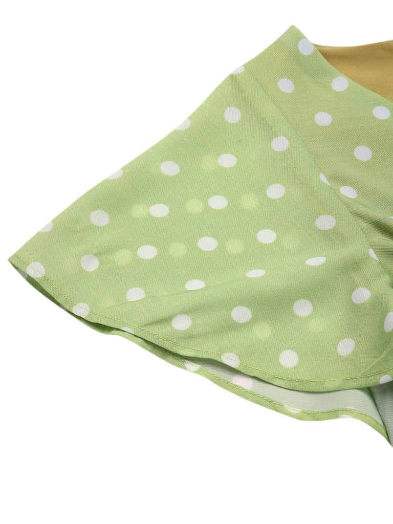 Robe verte à pois ajourés dans le dos des années 40
