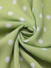 Robe verte à pois ajourés dans le dos des années 40