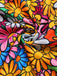 Robe hippie multicolore marguerites manches évasées des années 1960