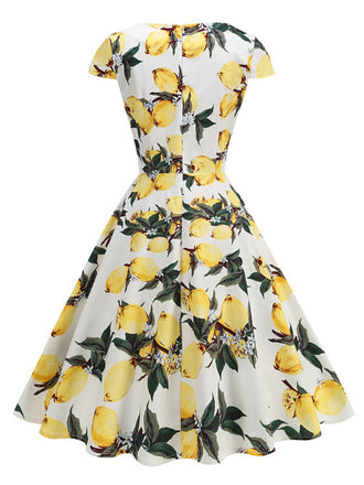 Robe Jaune motif citron surplombante col V des années 1950