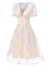 Robe blanche à fleurs brodées col V profond années 1950