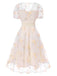 Robe blanche à fleurs brodées col V profond années 1950
