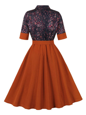 Robe patchwork fleurie rouge brique à revers des années 1950