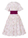 Robe fleurie manches cloche et décolleté en cœur Rose Viole des années 1950