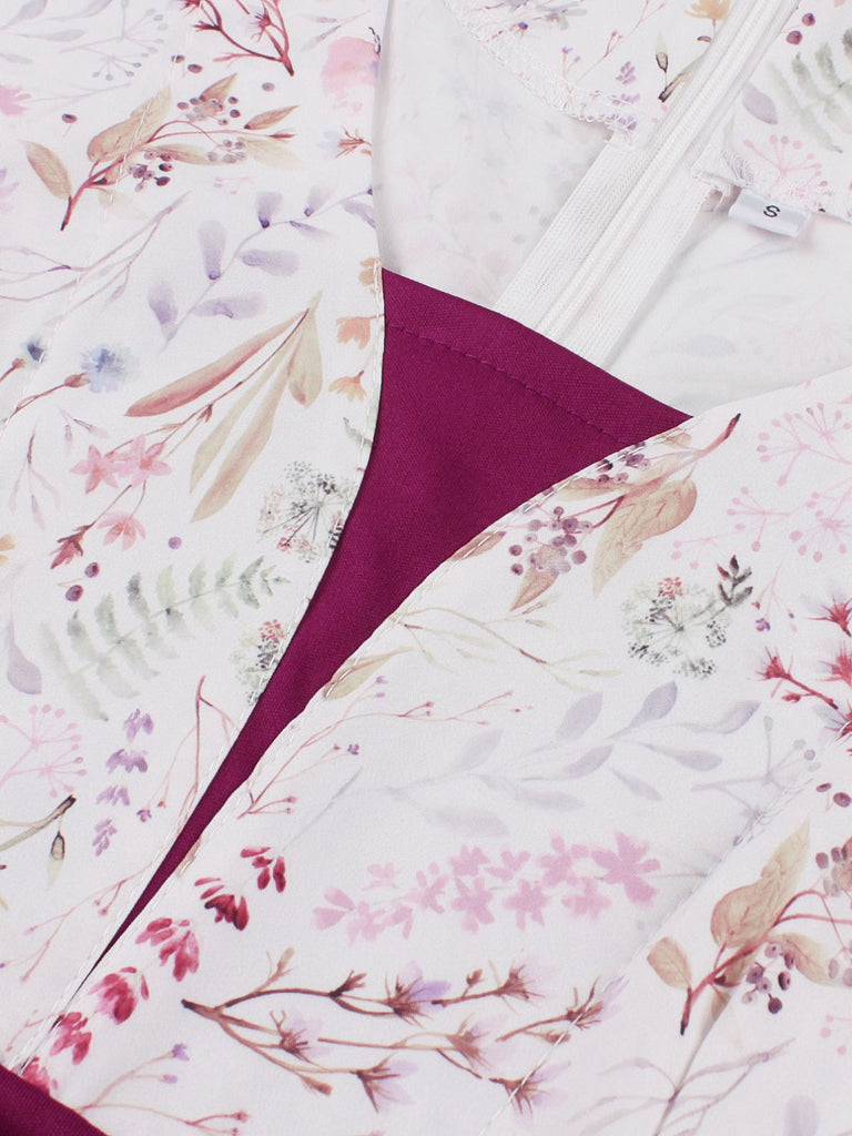 Robe fleurie manches cloche et décolleté en cœur Rose Viole des années 1950