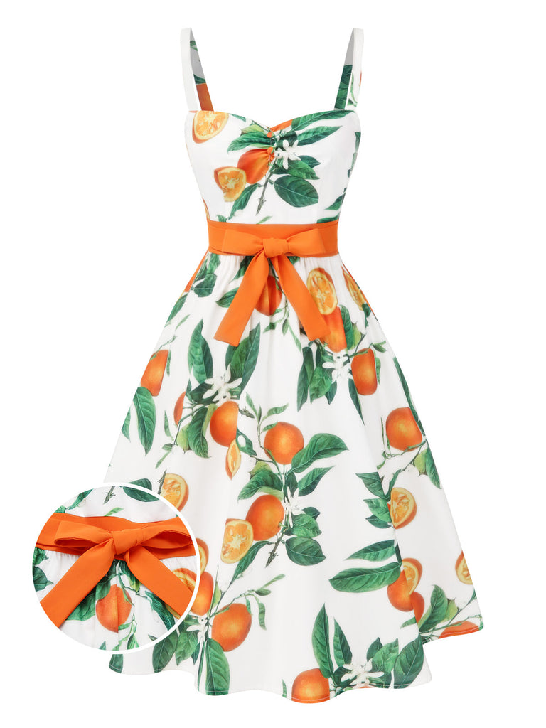 Robe orange à bretelles et nœud à la taille années 1950
