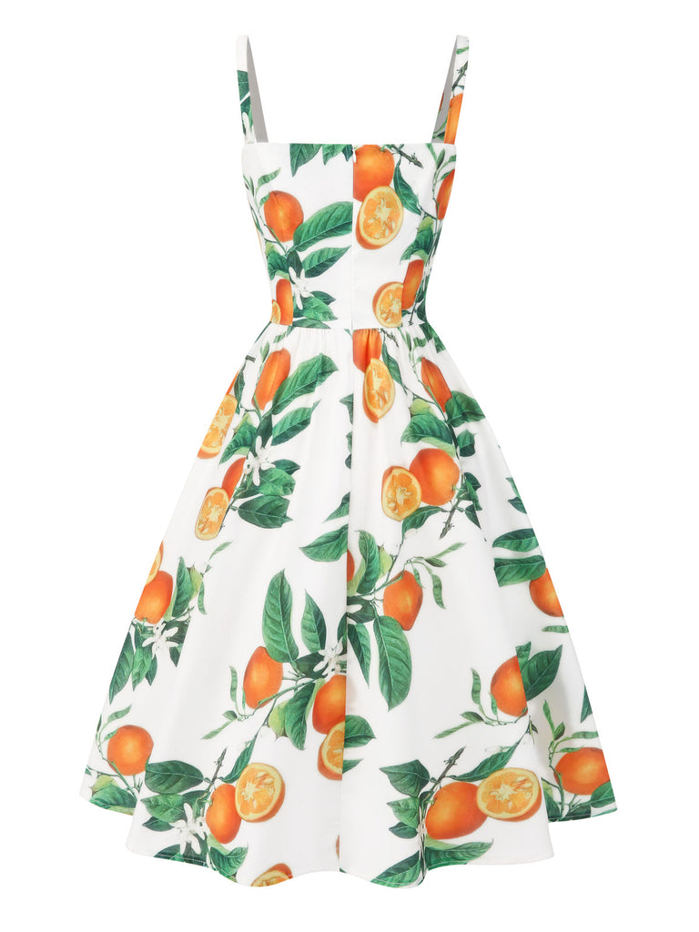 Robe orange à bretelles et nœud à la taille années 1950