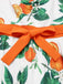 Robe orange à bretelles et nœud à la taille années 1950