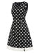Robe noire à pois et col en V des années 1960