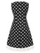 Robe noire à pois et col en V des années 1960