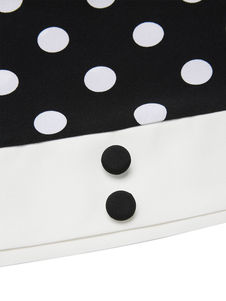 Robe noire à pois et col en V des années 1960