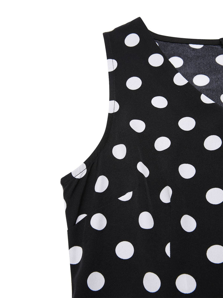 Robe noire à pois et col en V des années 1960