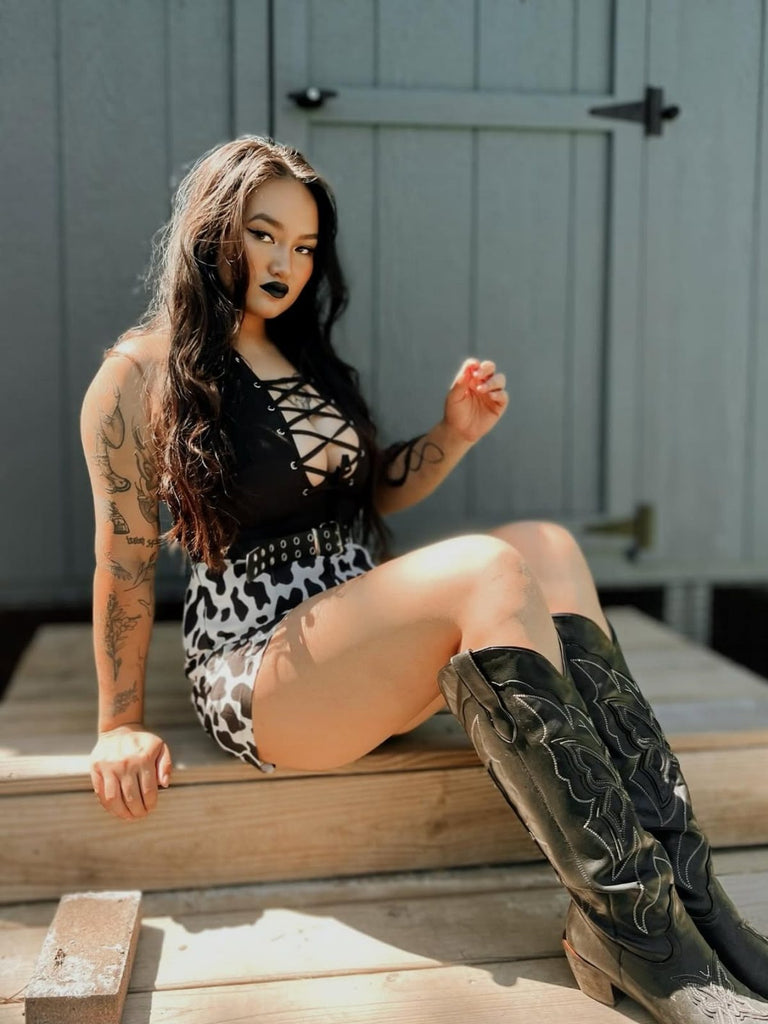 Combishort noire style punk imprimés peau de vache creuse des années 1980