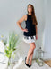 Robe noire patchwork col bateau et touches de piano des années 1960