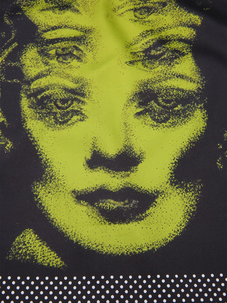 Robe noire à pois et imprimé visage années 1960