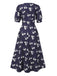 [Pré-vente] Robe bleue à pois manches bouffantes à fleurs des années 40