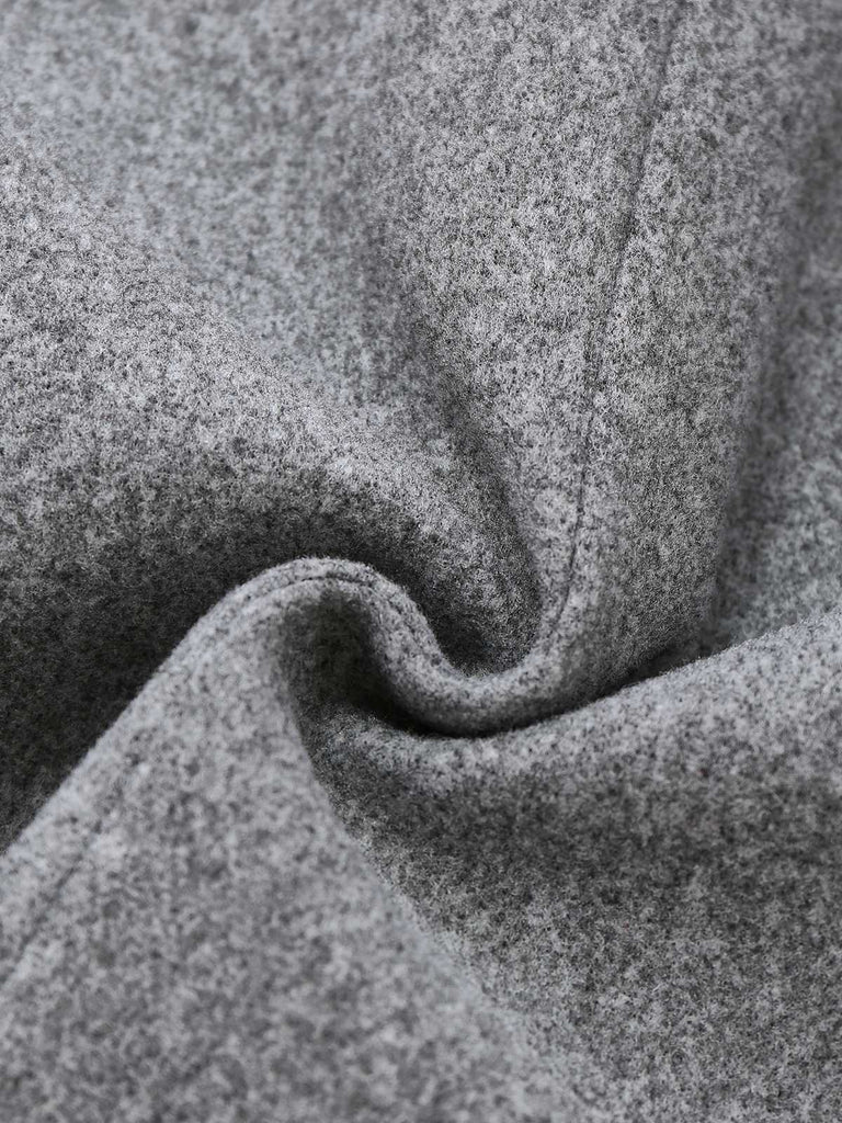 Veste grise à boutons et col montant en fausse laine années 1940