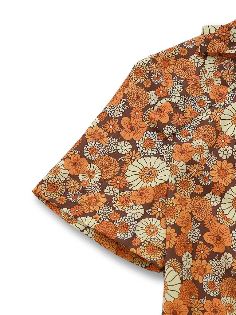 [Pré-vente] Combinaison orange col noué en velours côtelé motif marguerites années 1970