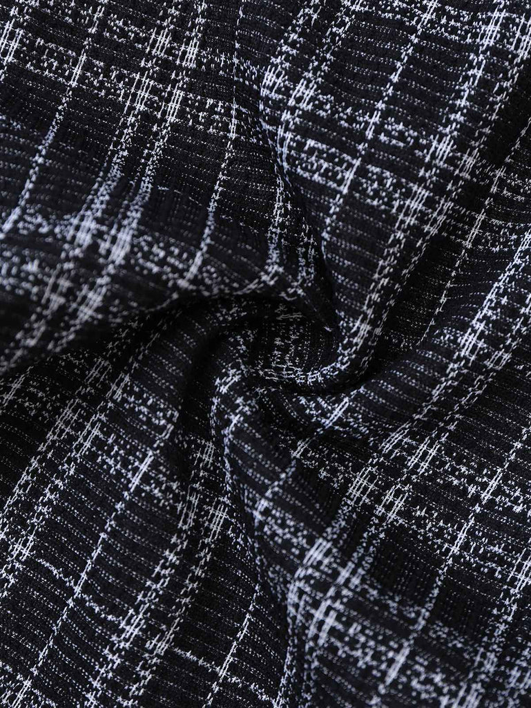 Combinaison salopette noire à carreaux en coton col en V profond des années 1940