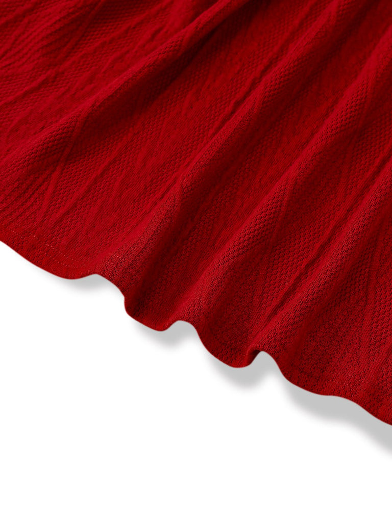 Robe boutonnée à gros col en V en maille unie des années 1940