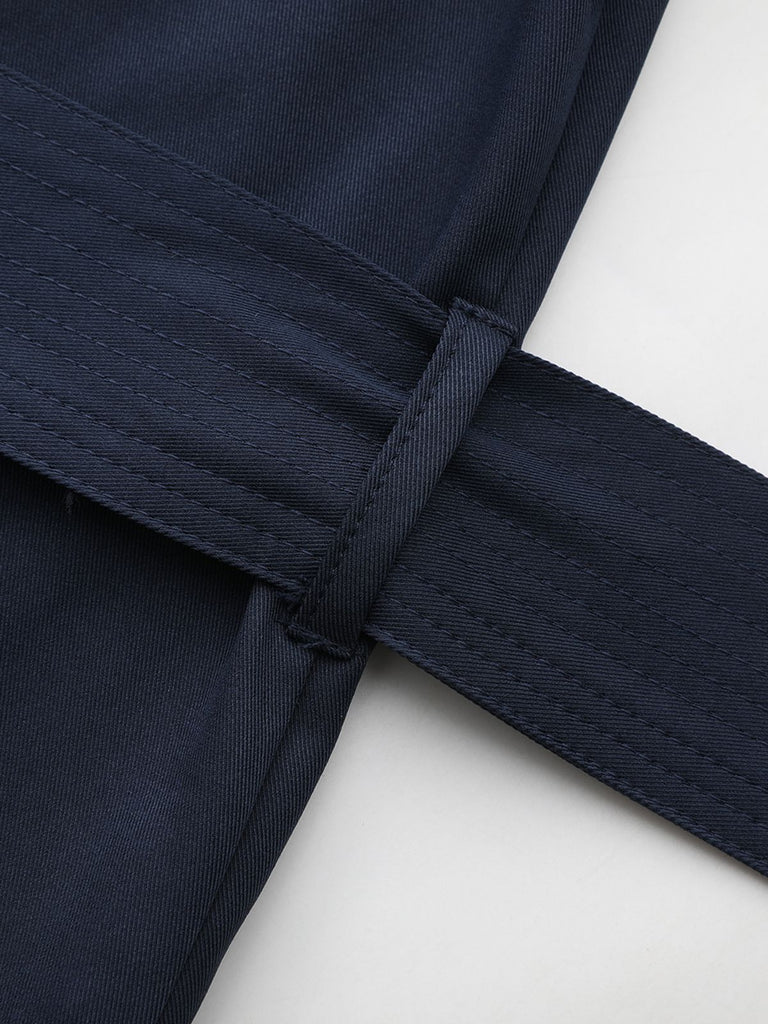 Trench-coat bleu à double boutonnage et col rond des années 1940