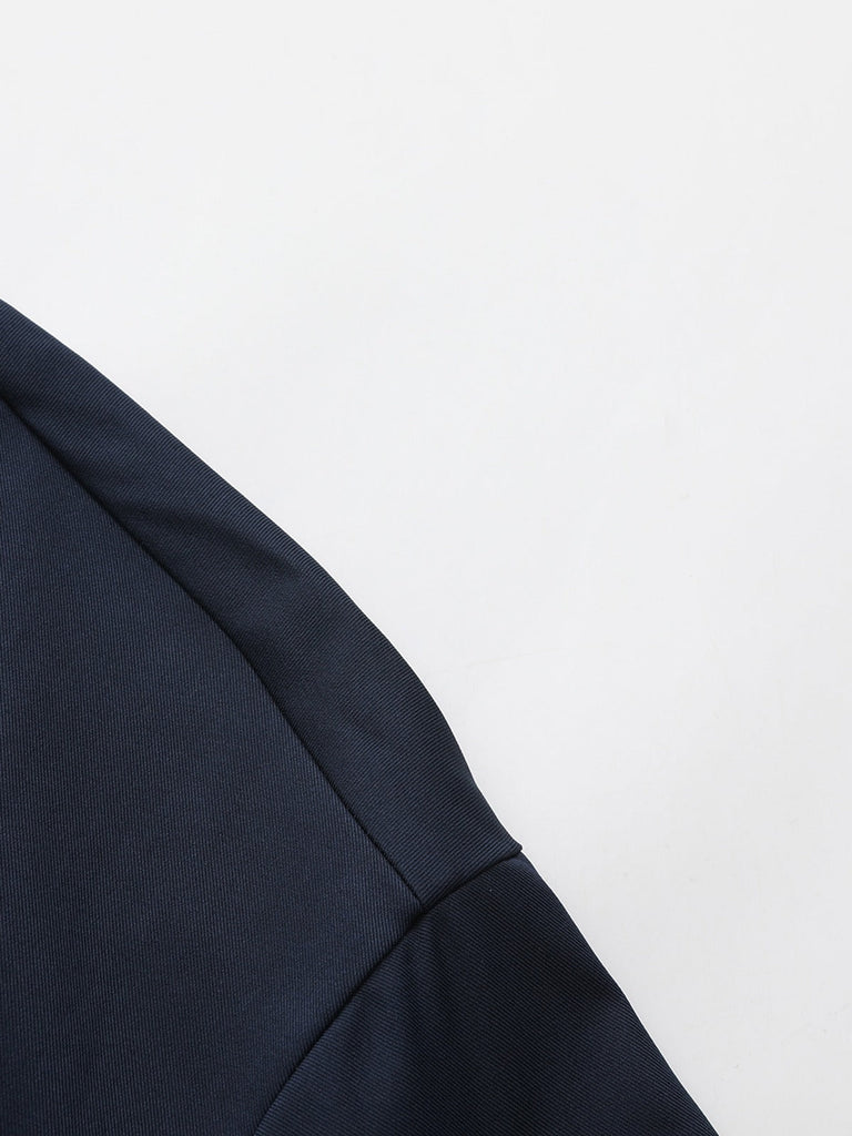 Trench-coat bleu à double boutonnage et col rond des années 1940