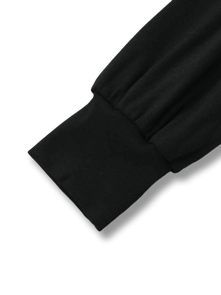 Haut tricoté noir col en V et manches lanternes style années 1950