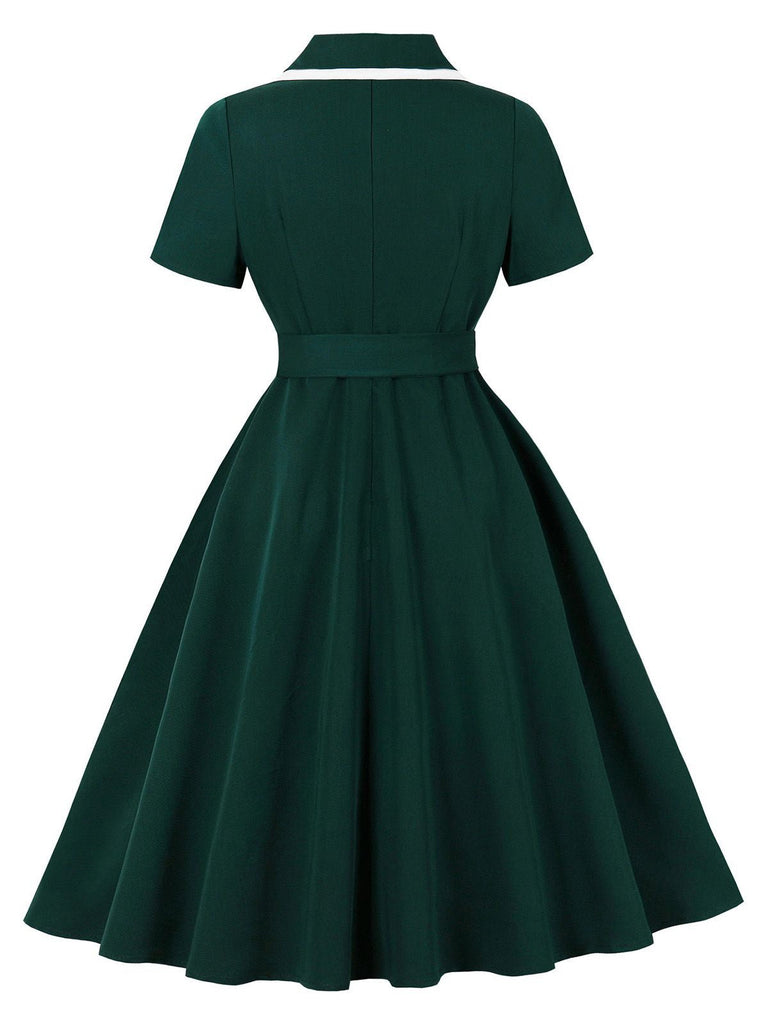 Robe trapèze vert foncé à revers contrastés années 1950