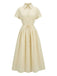 Robe jaune à col boutonné et ceinture à nouer années 1940