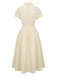 Robe jaune à col boutonné et ceinture à nouer années 1940