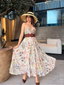 Robe bohème multicolore à fleurs col V années 1930