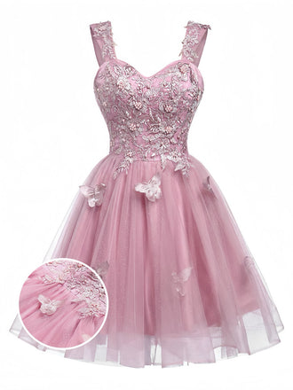 Robe courte rose à paillettes et papillons années 60