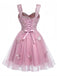 Robe courte rose à paillettes et papillons années 60