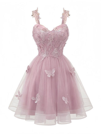 Robe courte rose à paillettes et papillons années 60