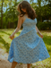Robe midi rose fines bretelles floral années 1950