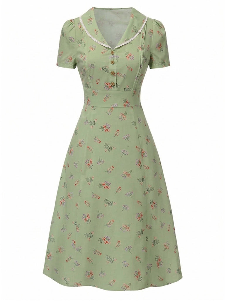 Robe vert à manches bouffantes et revers fleuris années 1940