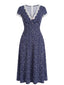 Robe bleu foncé dentelle florale et col V années 1940