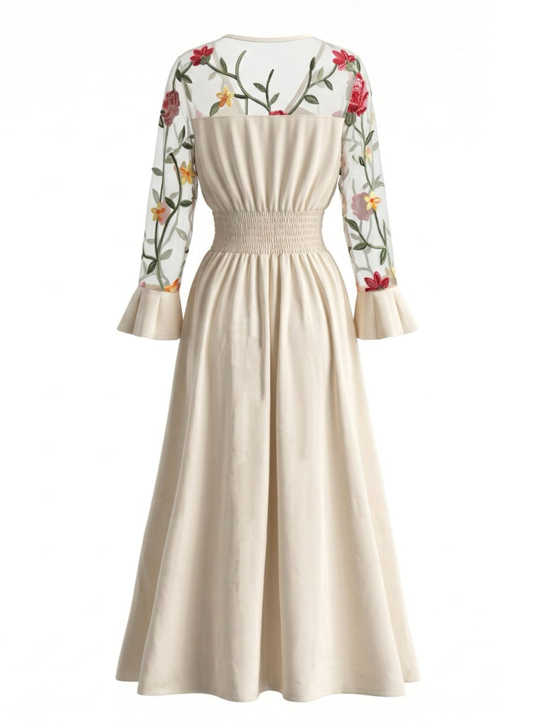 Robe longue ivoire à broderies florales et manches transparentes années 1950