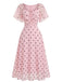 Robe midi rose pois manches bouffantes et décolleté cœur années 40