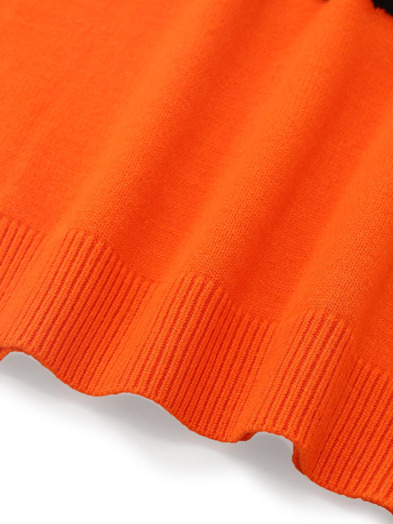 Pull orange en maille à visage de citrouille d’Halloween années 1970