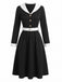 Robe noire et blanche à revers, col V et manches longues années 1950
