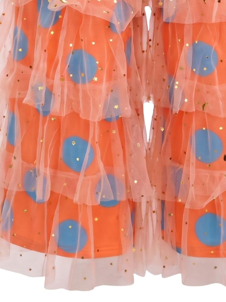Pantalon disco orange en tulle à pois et volants superposés années 1970