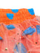 Pantalon disco orange en tulle à pois et volants superposés années 1970
