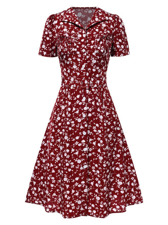 Robe marguerite à boutons revers rouge des années 1950