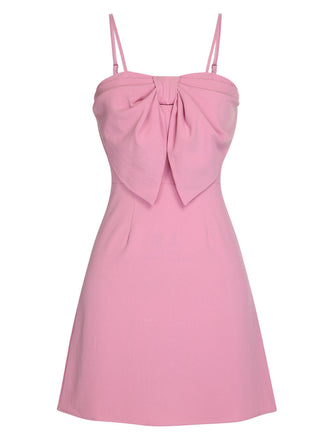 Robe rose unie à bretelles spaghetti et nœud style années 1950
