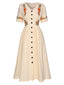 Robe fleurie brodée en coton beige à col en V des années 40