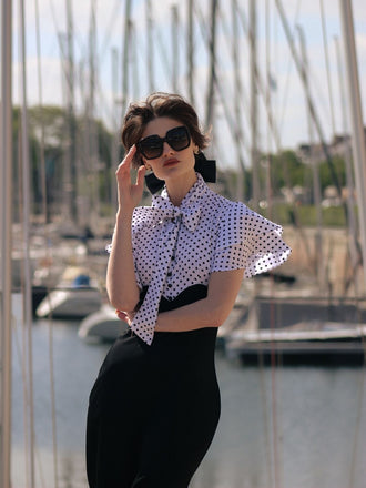 Robe sirène noire à pois et col noué des années 1930