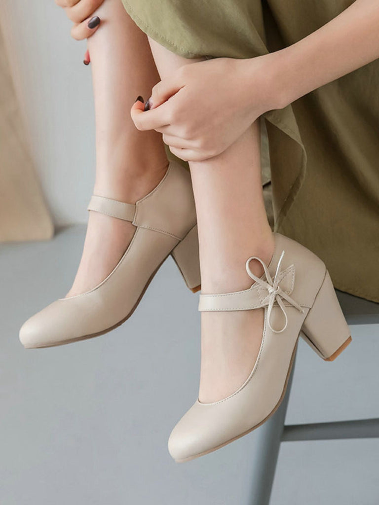 Escarpins rétro à bout rond et nœud papillon à talons épais