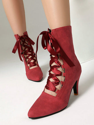 Bottes rétro à bout pointu lacées en faux daim ajouré